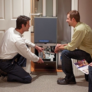 Team Installing heating unit