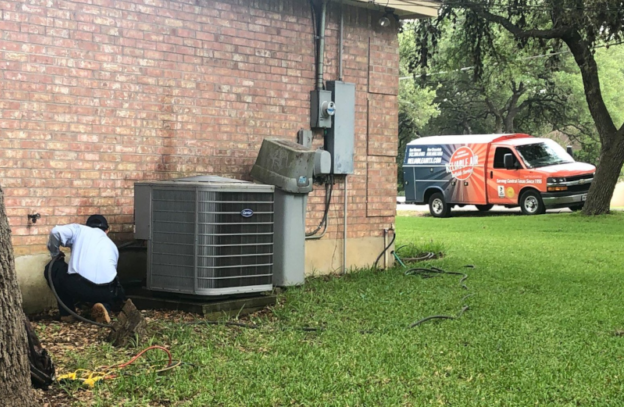 Technician Checking Household Unit 