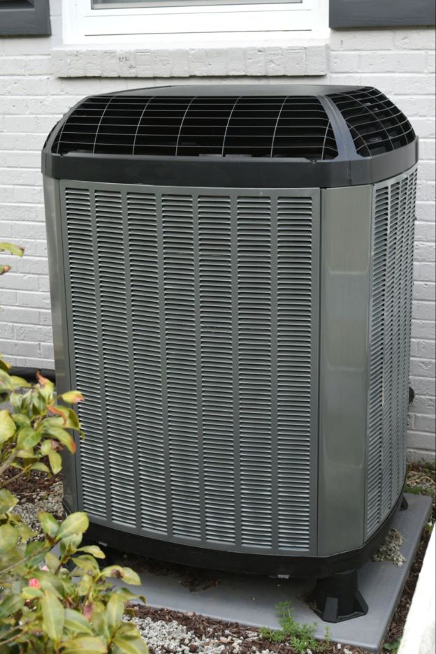 Single HVAC unit outside house 